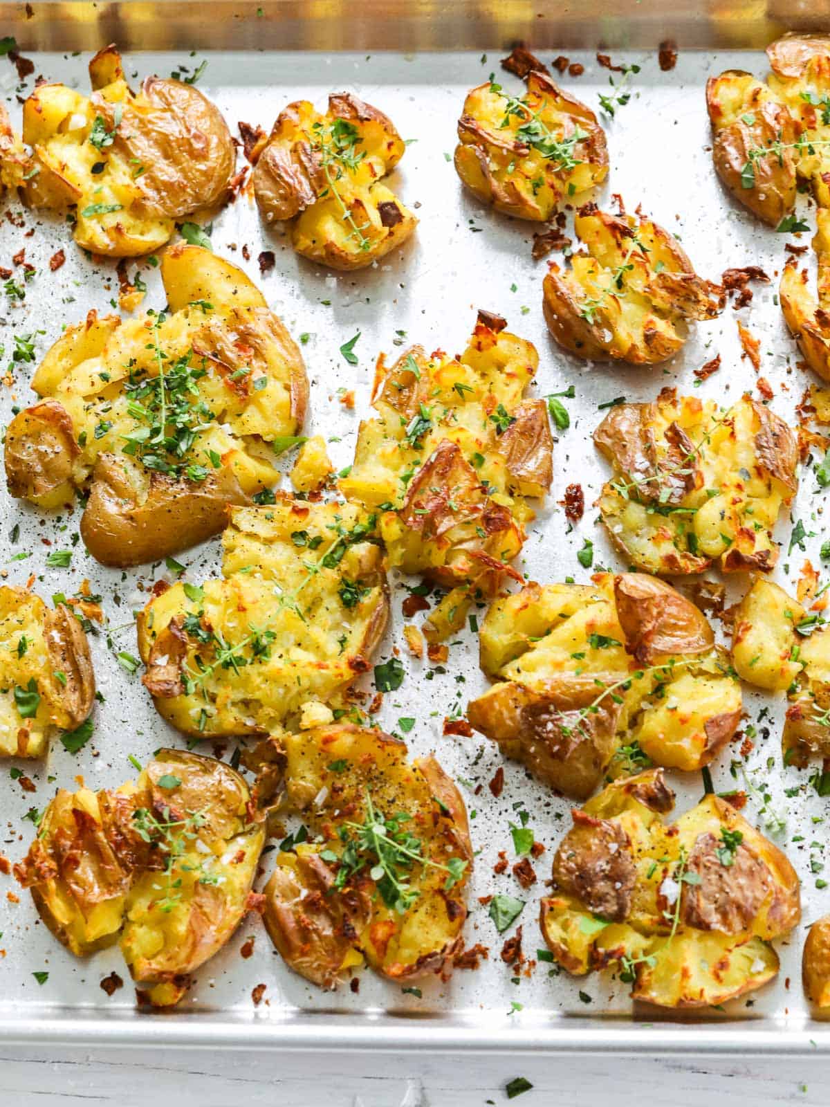 Smashed Potatoes with Garlic and Herbs - Ella Claire & Co.