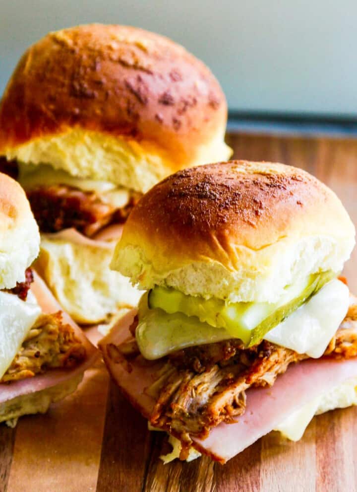 https://www.delicioustable.com/wp-content/uploads/2021/06/Cuban-Pulled-Pork-Sliders-featured-720x991.jpg